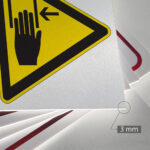 Tabliczka UWAGA RYZYKO ZAKLESZCZENIA RĄK - obrazek 3